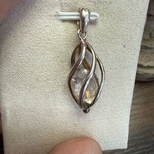 Caged Herkimer diamond pendant